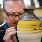Richard Heeley at work in his pottery in Shropshire Feb 2018